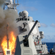 USS Mustin (DDG-89) launches an RUM-139 ASROC anti-submarine weapon from its forward VLS. US Navy photo.